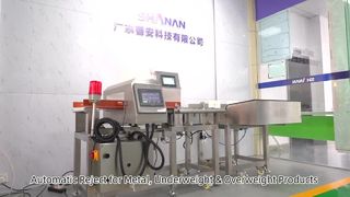 統合された金属検出器と重量チェッカー システム